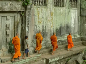 Young monk visit Koh Ker temples. The pre-Angkor, 10th century, Koh Ker Temple group comprising over 180 temples is set in a remote forested area north of Siem Reap.