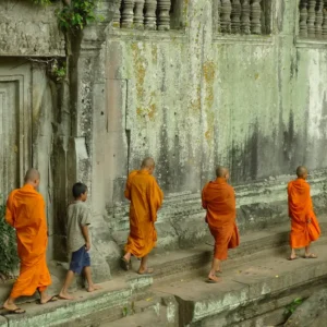 Young monk visit Koh Ker temples. The pre-Angkor, 10th century, Koh Ker Temple group comprising over 180 temples is set in a remote forested area north of Siem Reap.